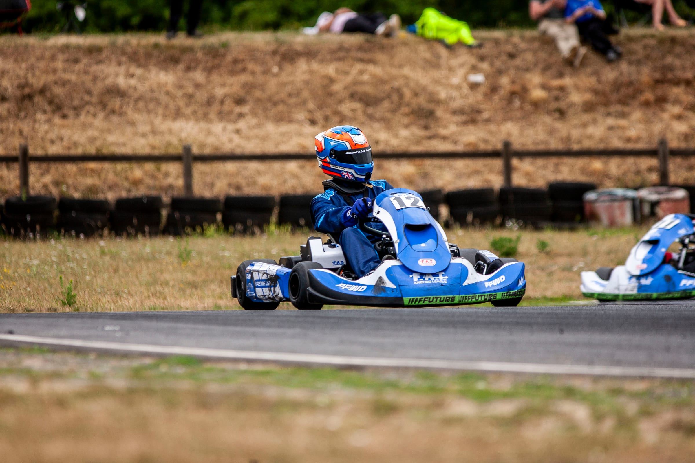 Keelan on a straight with spectators behind