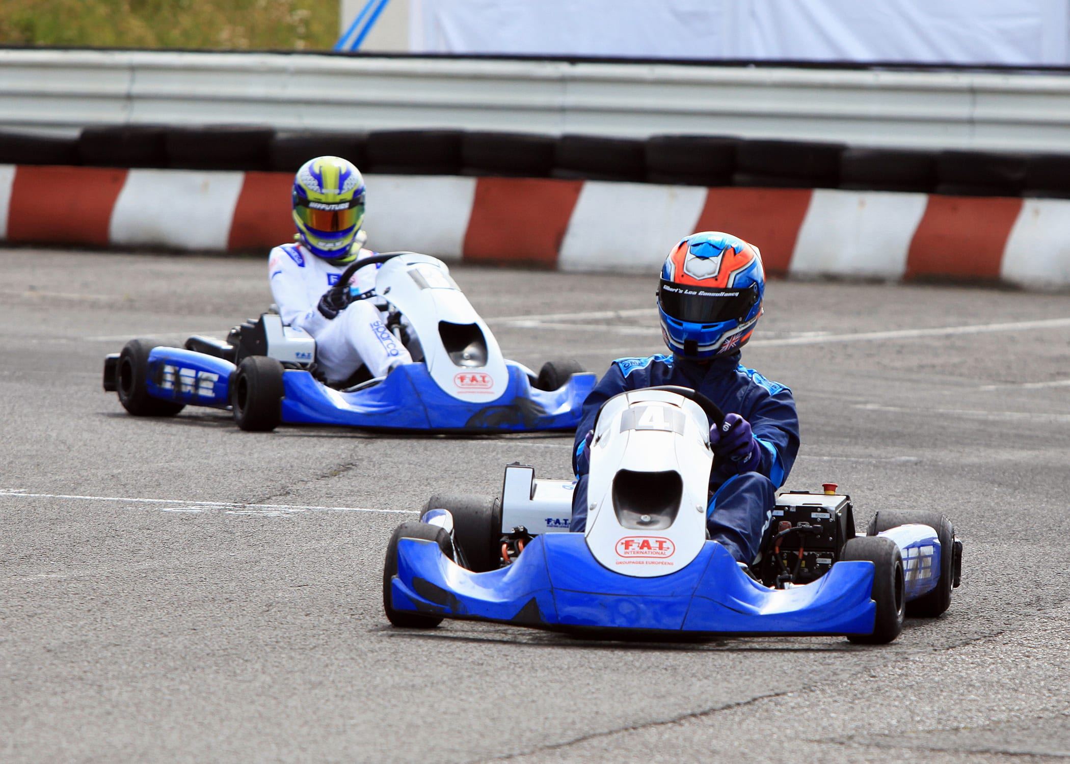 Keelan racing wheel to wheel with another kart